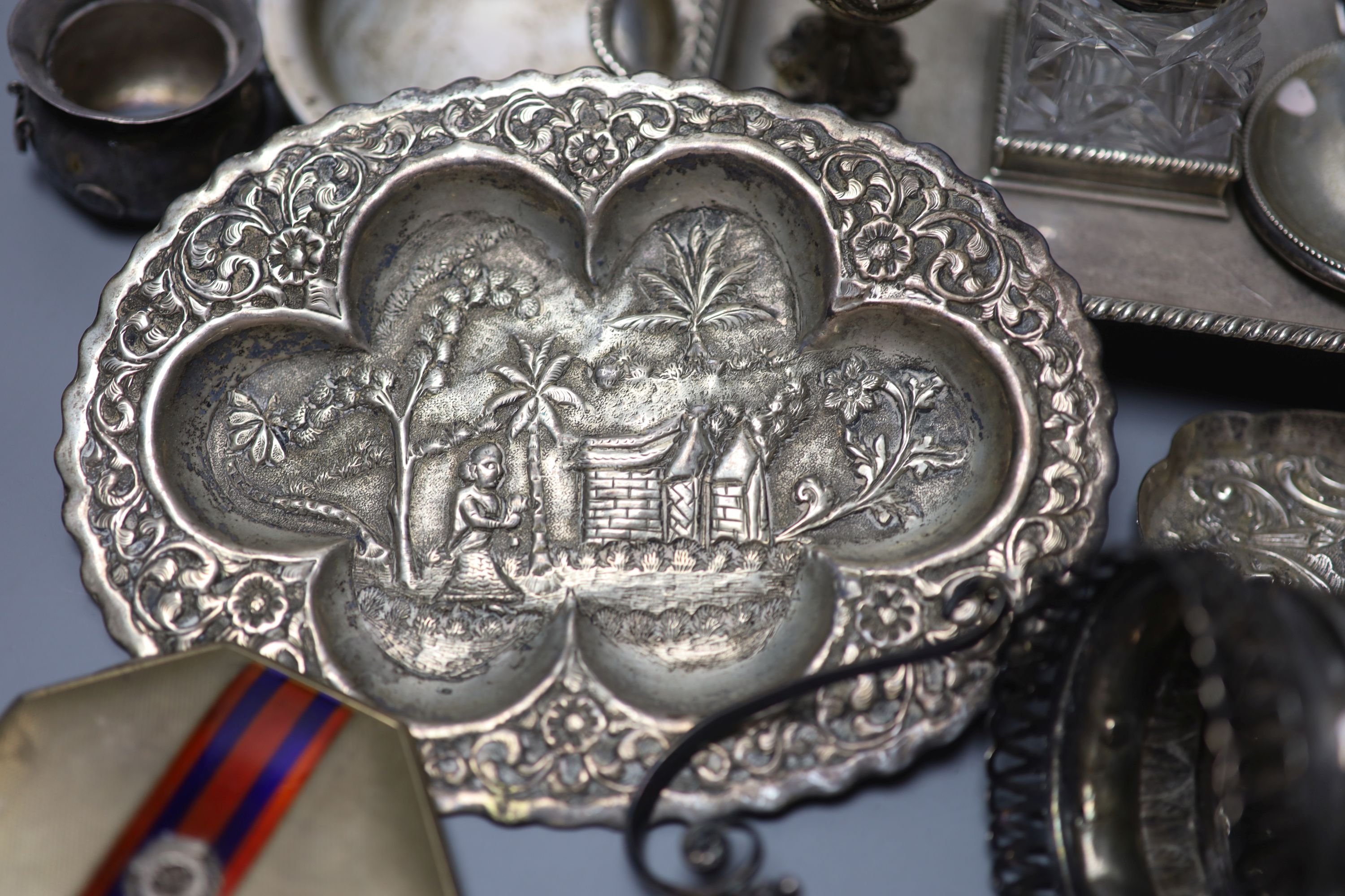 A Victorian silver inkstand, London, 1895, 19.1cm and sundry small silver etc. including taperstick, compact etc.